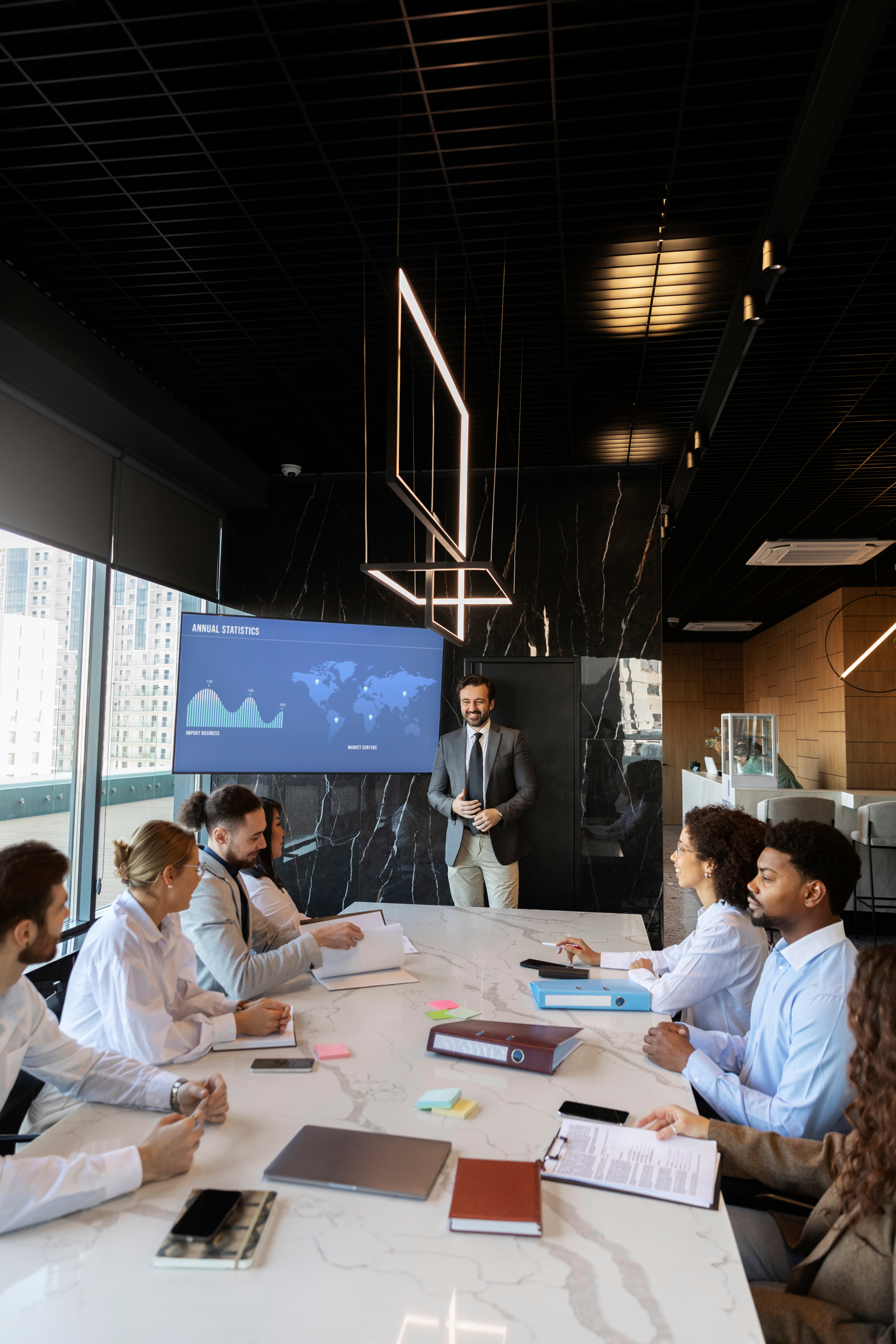 Man presenting to co-workers